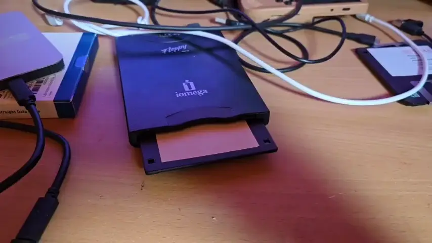USB floppy drive reading a disk as a Zaparoo token