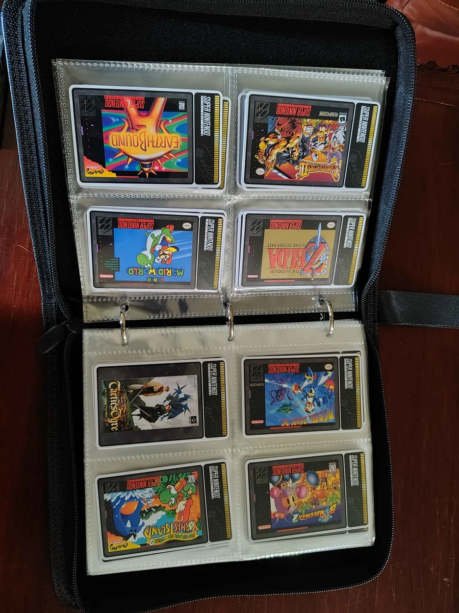 SNES game cards arranged in a small zippered card binder