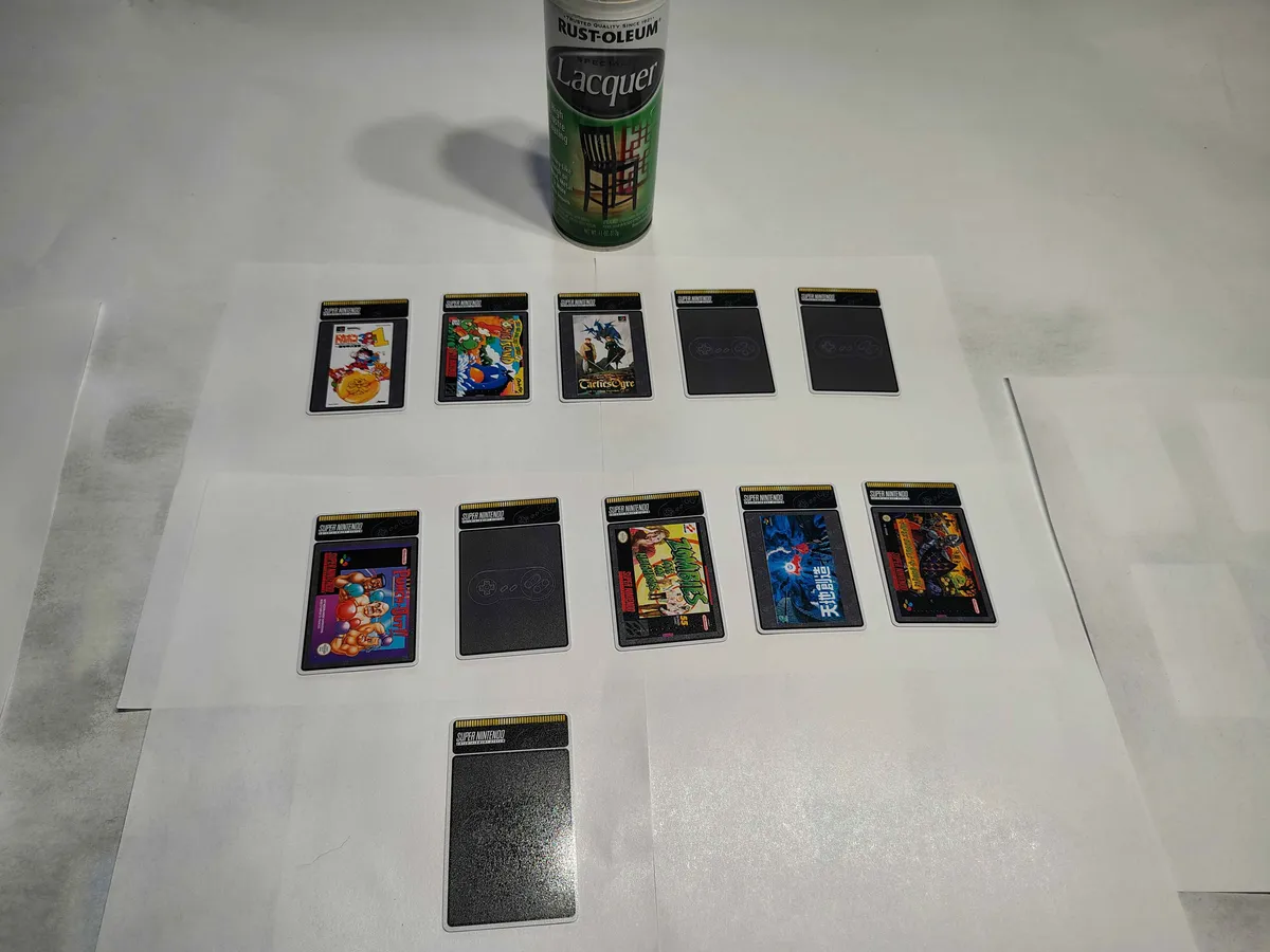 Printed NFC cards laid out for a protective lacquer coating